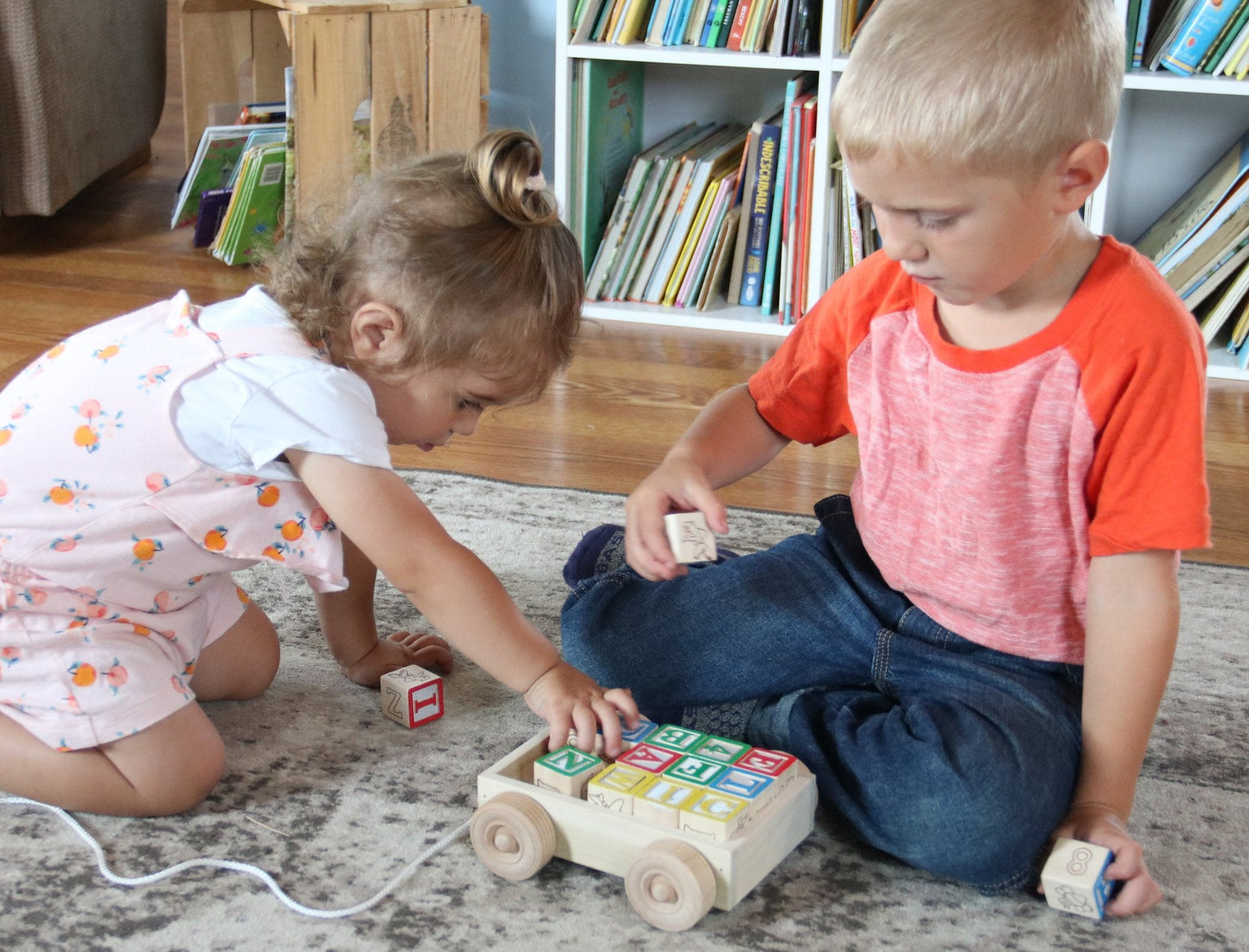 Amish-made wooden ABC block toddler pull-string wagon toy with colorful alphabet blocks inside, perfect for early childhood play.