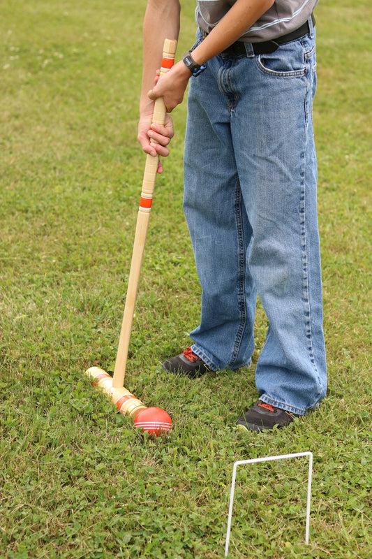 Amish-made Deluxe Croquet Game Set with six wooden mallets, balls, and a wooden holder, perfect for outdoor family fun.