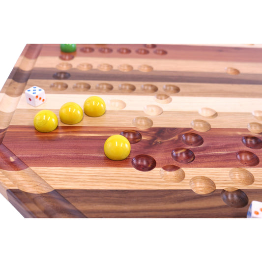 Multi-Wood Aggravation marble game board set, 24-inch wide, with colorful marbles and wooden game pieces on a polished wooden surface.