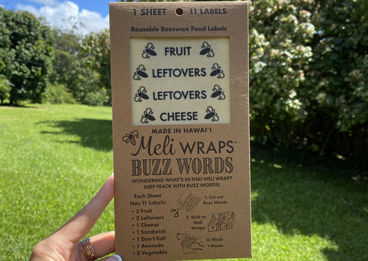 Set of Meli Wraps Beeswax Wrap Food Labels with colorful buzz word designs for reusable food storage accessories.