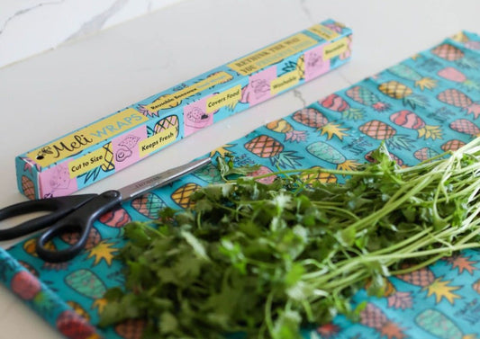 Meli Wraps beeswax rolls with pineapple print, bulk pack of reusable beeswax wraps for food storage.