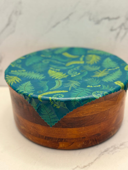 Set of three Meli Wraps beeswax food wraps in fern print, small, medium, and large sizes for eco-friendly food storage.
