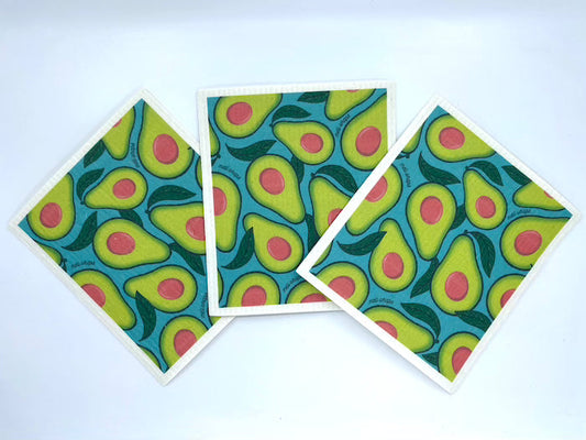Set of three Meli Wraps avocado Swedish dish cloths for kitchen use, featuring vibrant green avocado design.