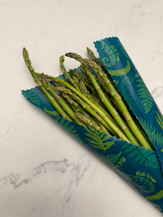Set of three Meli Wraps beeswax wraps in Hawaiiana print, including small, medium, and large reusable food wraps.