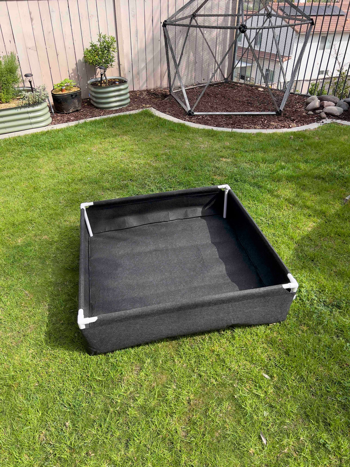 Fabric raised worm farm by Meme's Worms, small worm bin for composting with breathable fabric sides and raised design.