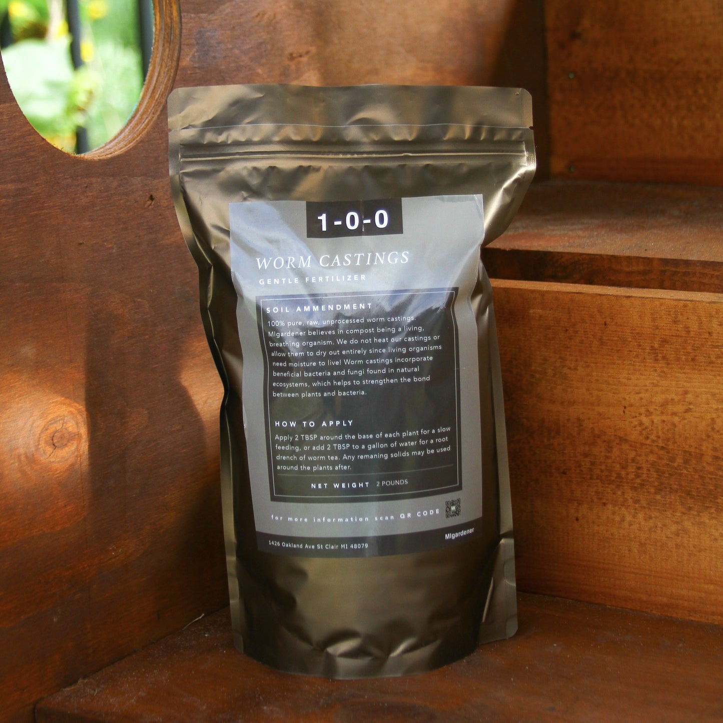 MIgardener worm castings in a 2lb bag, rich organic fertilizer with dark, crumbly texture for gardening use.