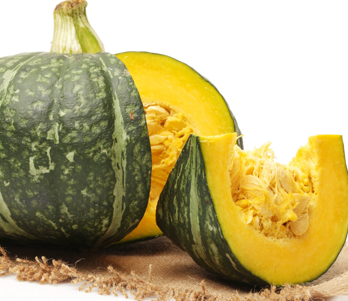 Kabocha squash from MIgardener, fresh and ripe, showcasing its vibrant orange flesh and smooth, rounded green skin.