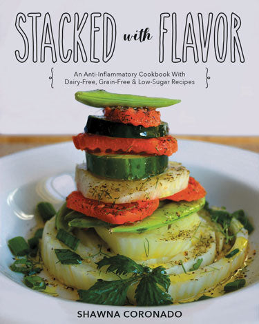 Mother Earth News Stacked With Flavor cookbook cover featuring dairy-free, grain-free, low-sugar anti-inflammatory recipes.