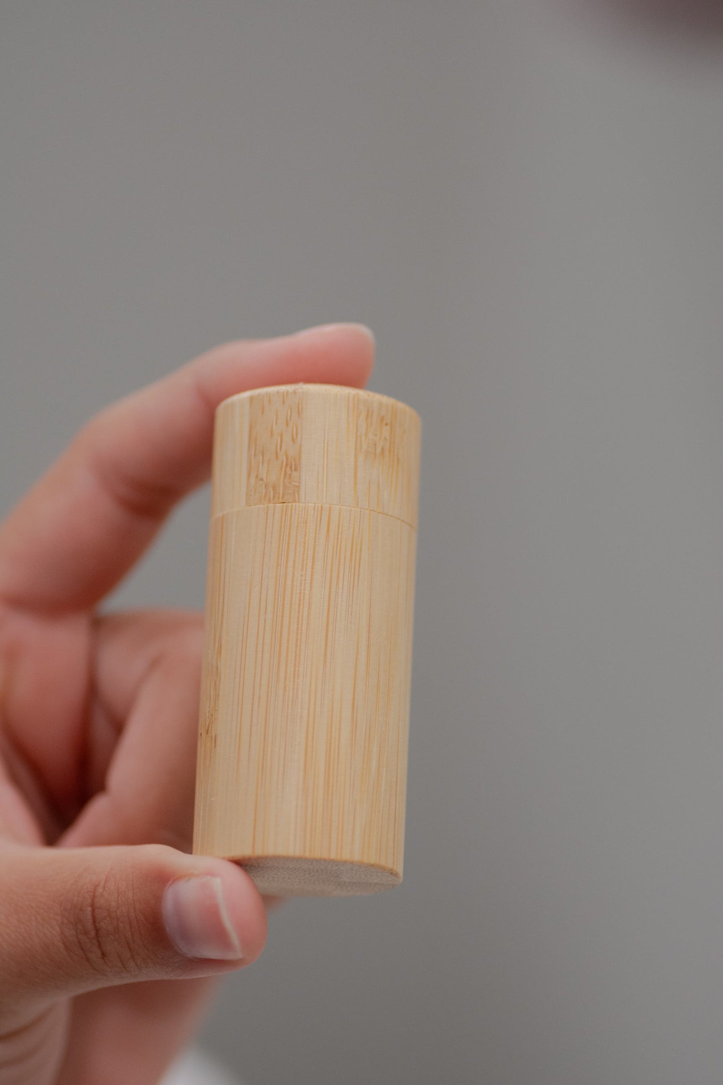 Charcoal floss in a bamboo holder from NO TOX LIFE, eco-friendly dental floss for natural oral care.