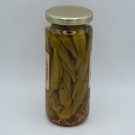 Jar of Amish Country Store pickled hot okra in a 16oz jar, showing vibrant green okra spears soaked in spicy brine.