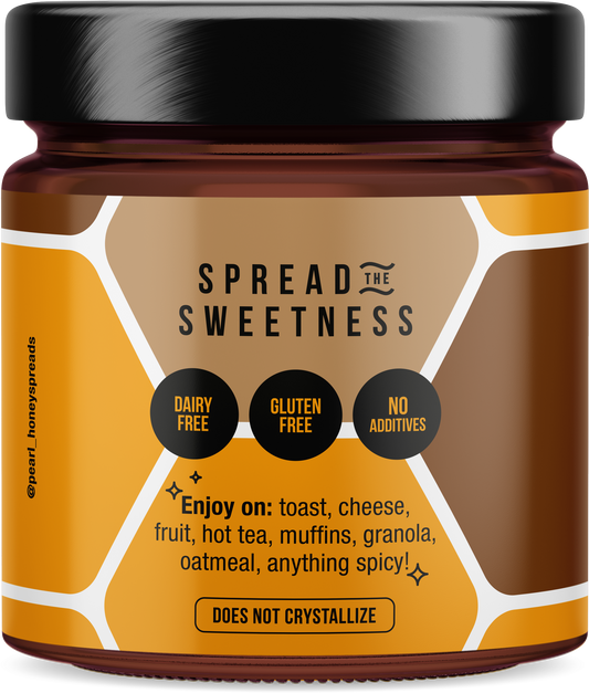 Creamed cacao honey spread by Pearl Honey Spreads, smooth and rich cacao-infused honey in a jar.