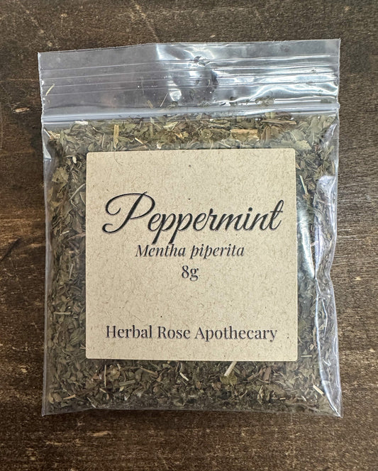 Dried peppermint herbs in an 8g package, natural herbal product from HerbalRoseApothecary with fresh green peppermint leaves