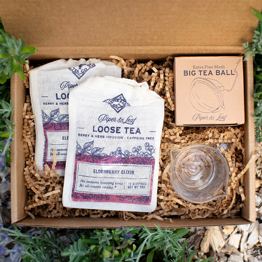 Elderberry Syrup Starter Brewing Kit by Piper and Leaf Tea Co., gift set with jars, brewing tools, and ingredients for making elderberry syrup.