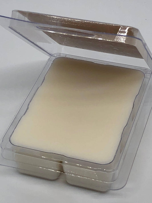 Vegan soy wax melts and candles from Prairie Fire Tallow, featuring blue and lavender colors with small-batch craftsmanship.