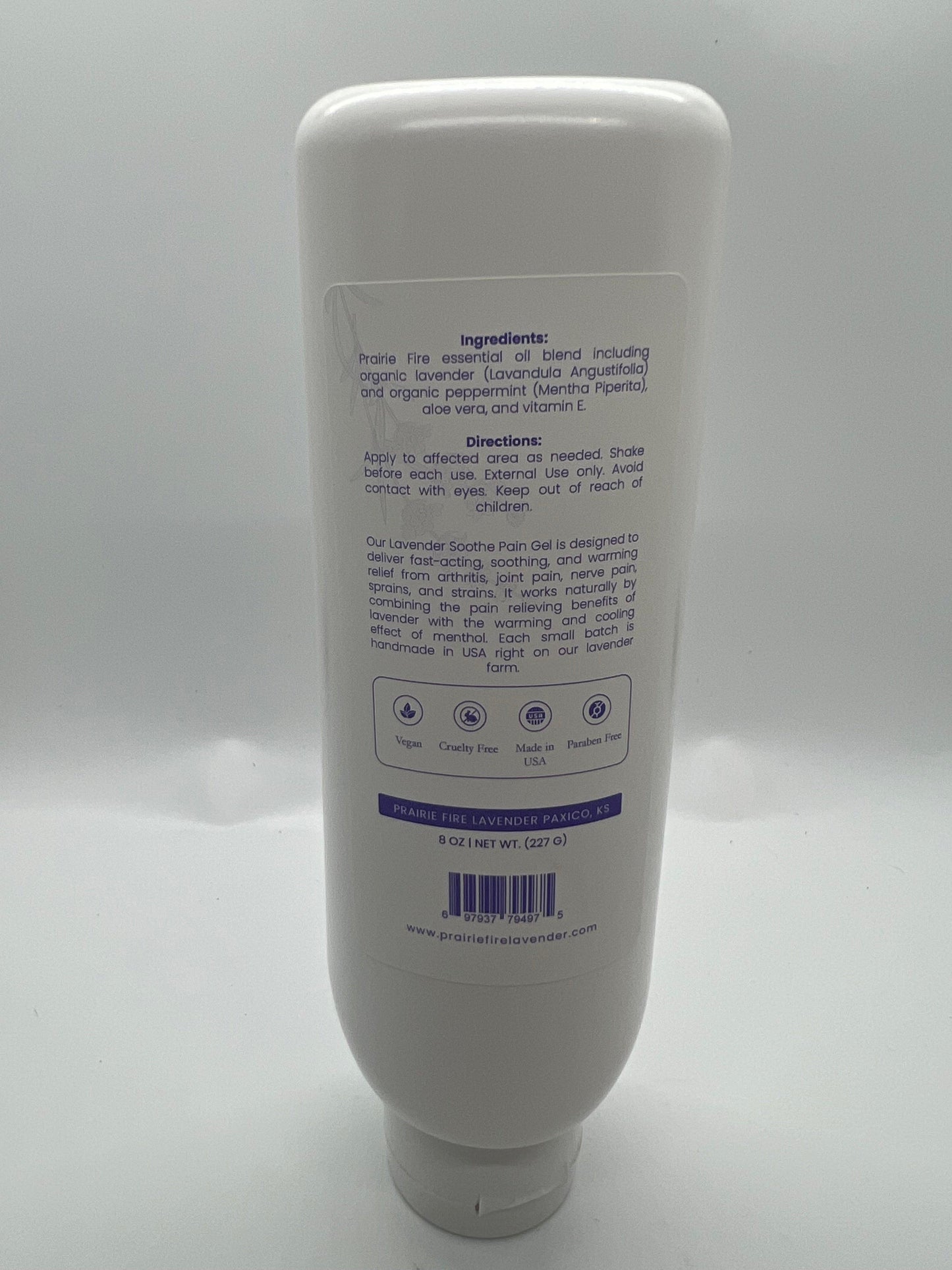 Lavender & menthol soothe pain gel in an 8 oz bottle from Prairie Fire Lavender Farm, with lavender flowers and gel visible.