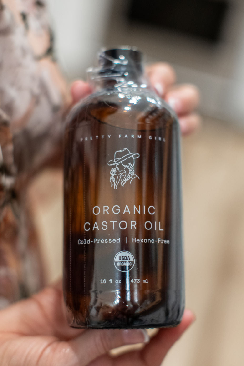 Organic Pure Castor Oil and Cloth Pack bundle by Pretty Farm Girl, featuring 8oz bottle and reusable cloth for skincare use.