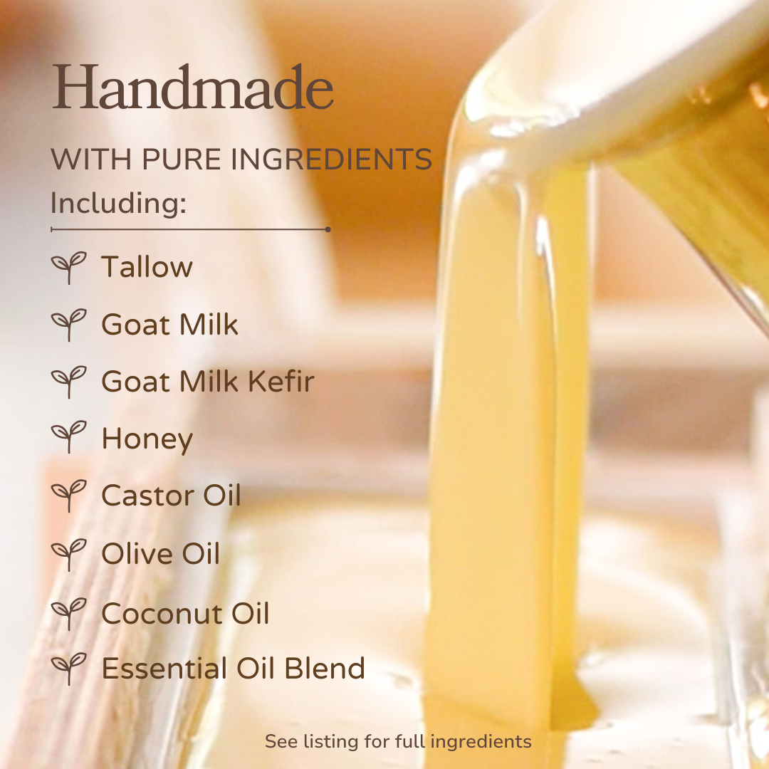 Handmade citrus cedarwood soap bar by Pretty Farm Girl, featuring tallow and goat milk ingredients, shown with soap lather.