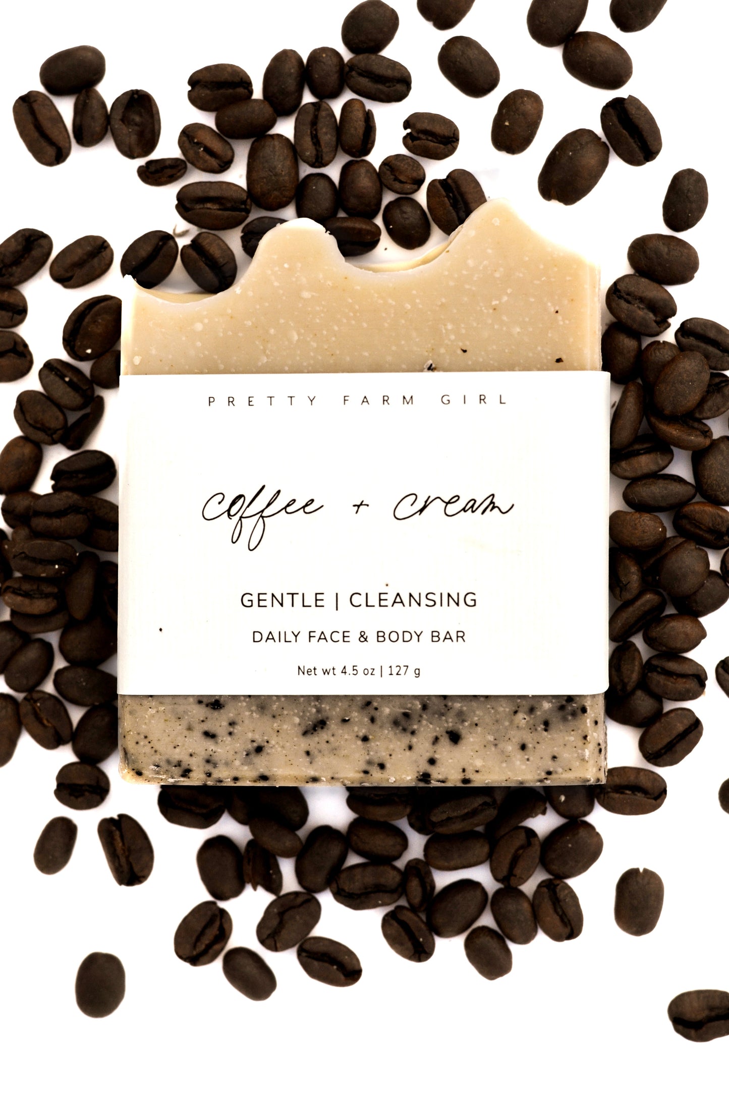 Handmade Coffee and Cream Tallow and Goat Milk Bar Soap by Pretty Farm Girl, showing a creamy soap bar with coffee and cream swirls.