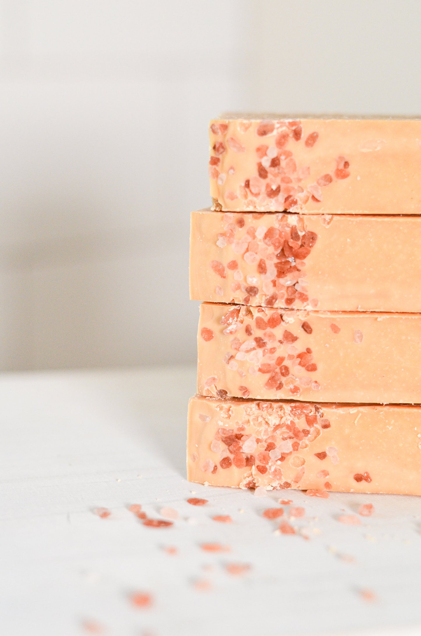 Handmade Pink Salt and Grapefruit Bar Soap by Pretty Farm Girl, featuring tallow and goat milk, with pink and citrus tones.