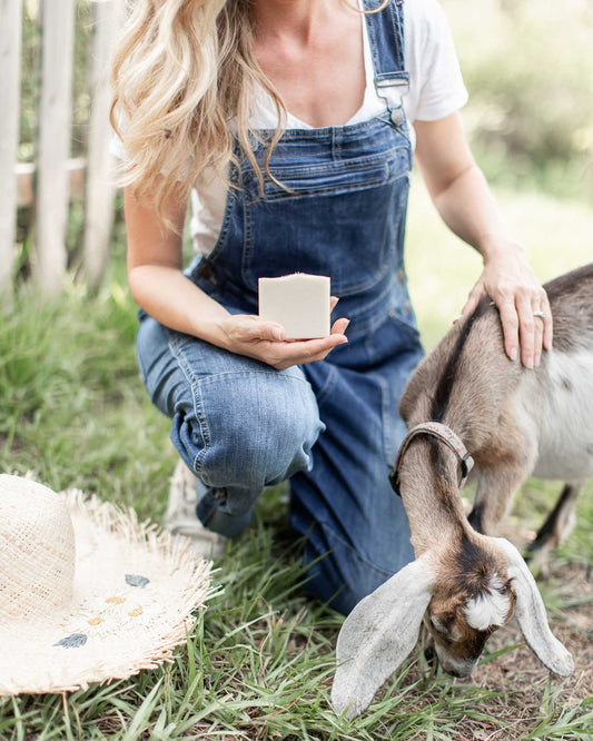 Wild lavender handmade tallow and goat milk soap bar by Pretty Farm Girl, showing a rustic soap with lavender and creamy texture.