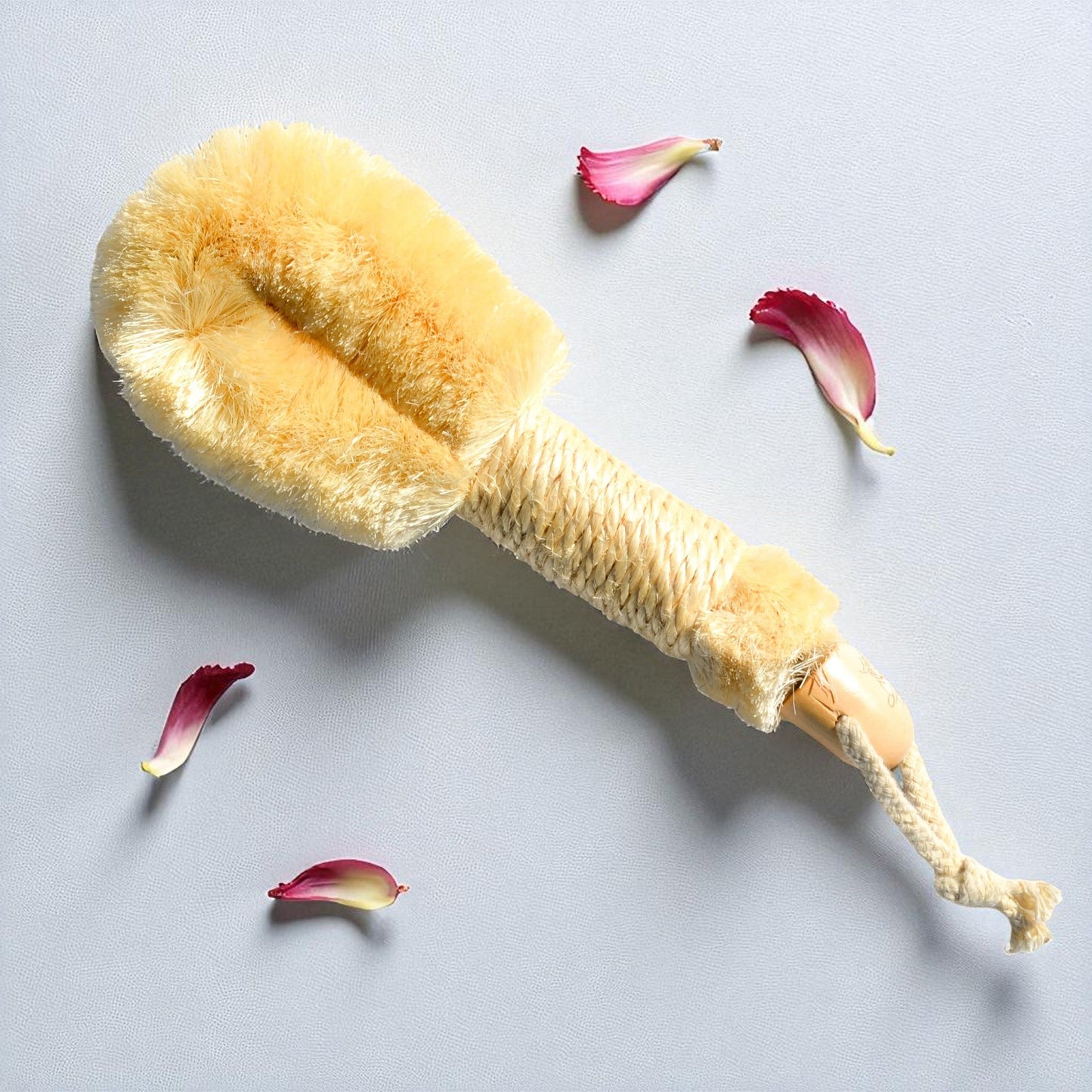 Pretty Farm Girl sisal exfoliating dry brush with wooden handle for gentle skin exfoliation and dry brushing.