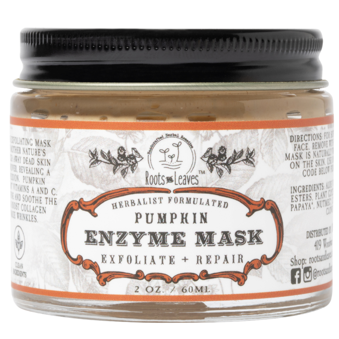 Cream-colored pumpkin enzyme face mask in a jar, showcasing natural ingredients for skincare by Roots and Leaves LLC.