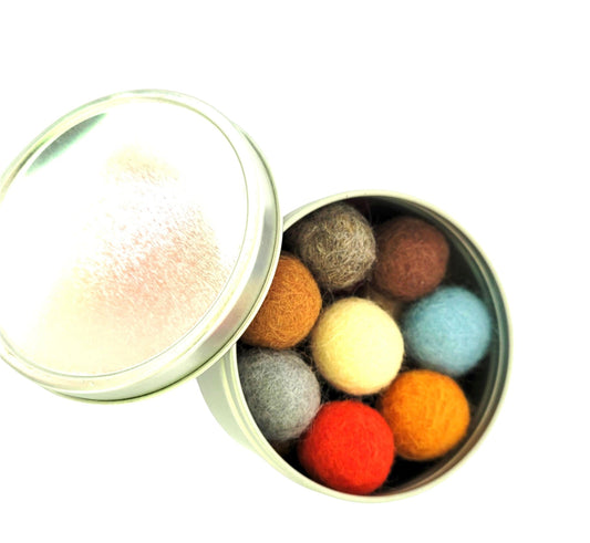 Organic wool cat ball toys from ReNewedPet, colorful felted wool balls designed for cats to play and chase.