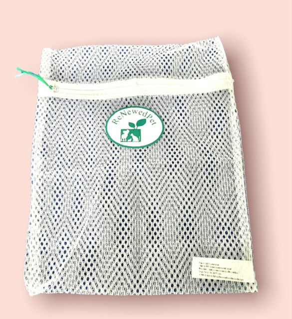 Reusable cotton pads for pet grooming by ReNewedPet, shown in a pack of four, ideal for gentle cleaning of pets.