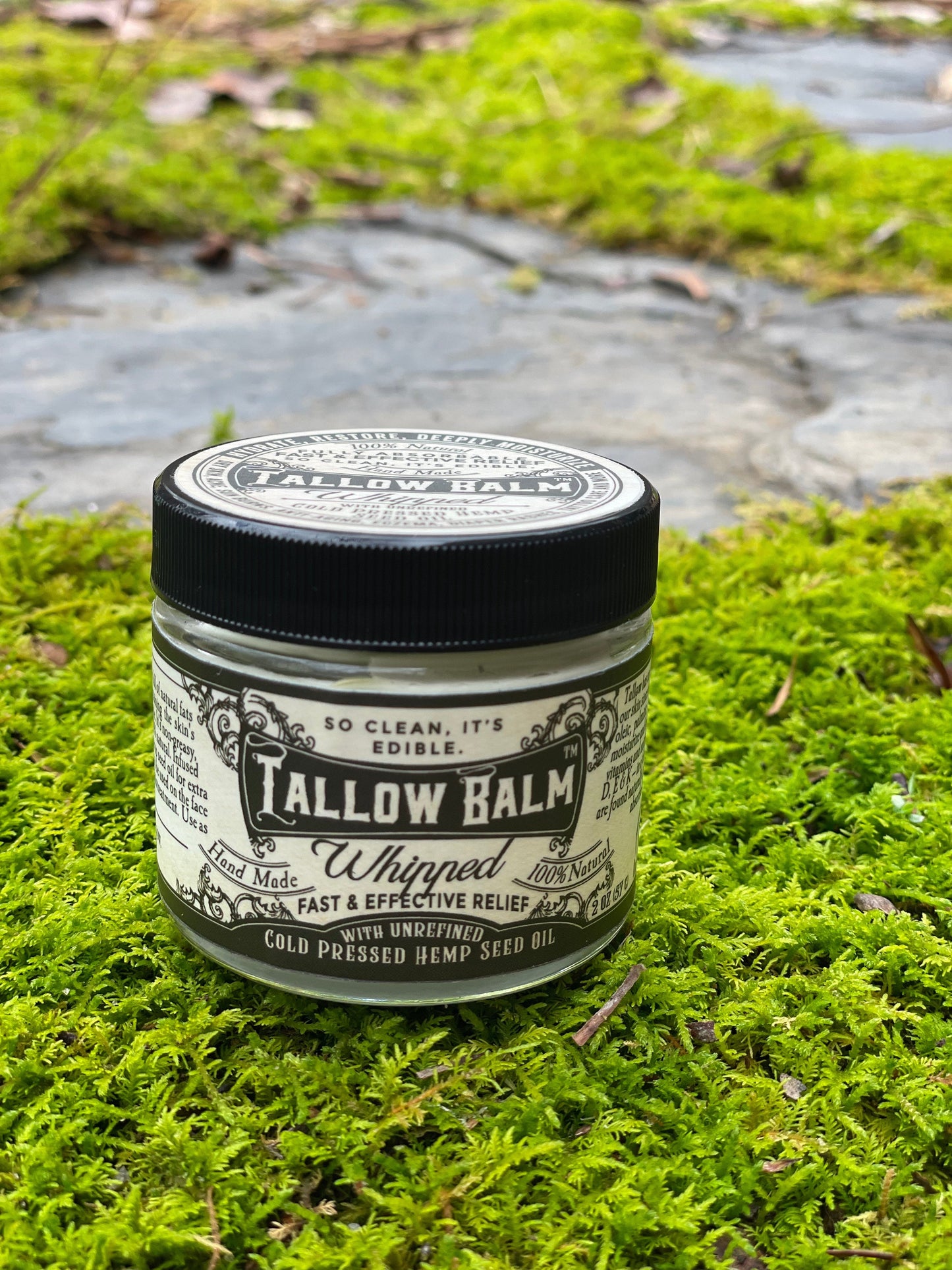Whipped Tallow Balm body cream with hemp seed oil by Roots and Leaves LLC, showing a smooth, creamy lotion in a 2 oz jar.