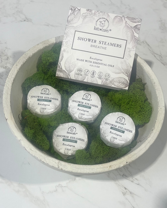 Eucalyptus shower steamer and bath bomb by Roots and Leaves LLC, featuring fresh eucalyptus scent and natural ingredients.