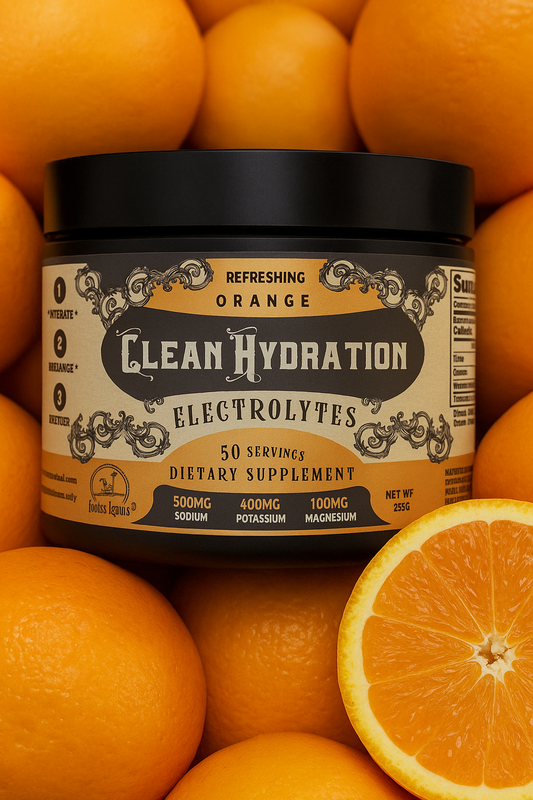 Glass of orange electrolyte drink from Roots and Leaves LLC featuring fresh orange slices for hydration and refreshment.