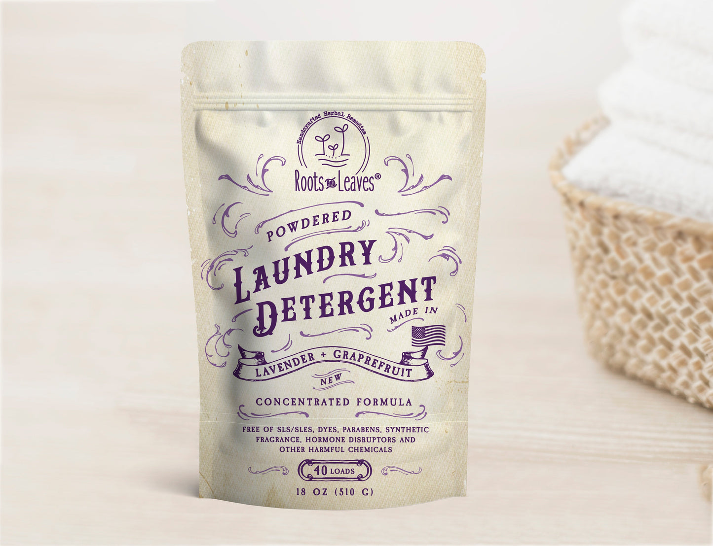 Powdered laundry detergent from Roots and Leaves LLC in a white bag with blue and green accents, designed for cleaning clothes.