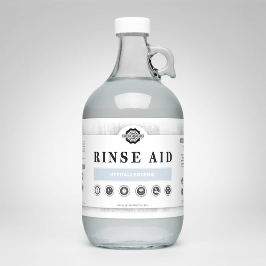 Rustic Strength unscented rinse aid for automatic dishwashers in a 16 oz bottle with flip-top spout.