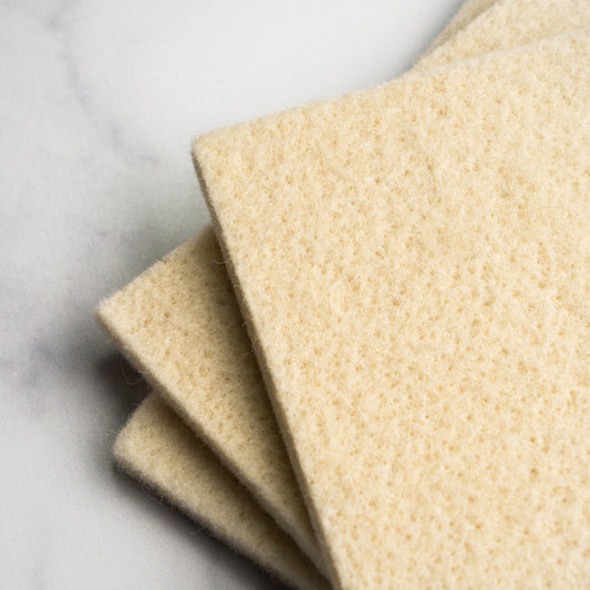 Rustic Strength sustainable wool scrub for multi-purpose cleaning, showing a close-up of the eco-friendly wool cleaning pad.