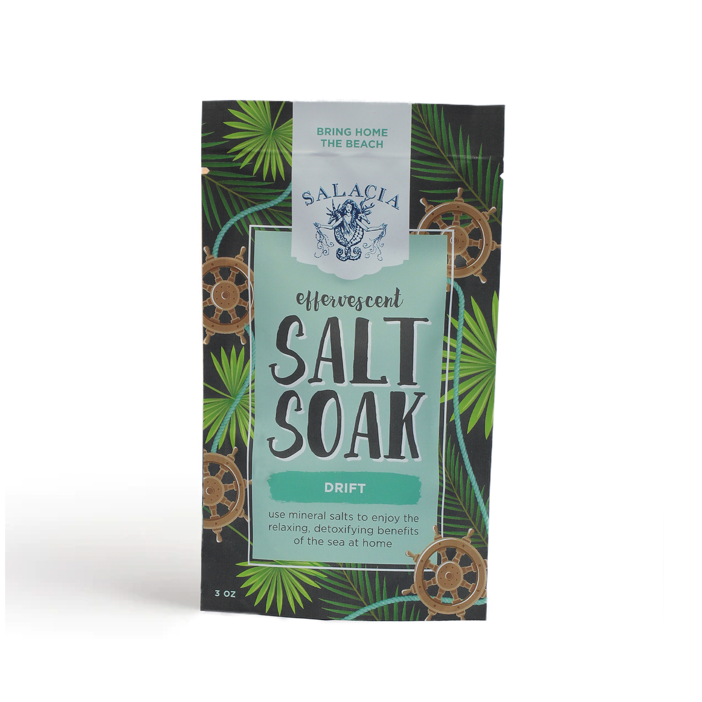 Salacia Salts Drift Effervescent Salt Soak in a clear jar, showing vibrant salts ideal for relaxing bath and body use.