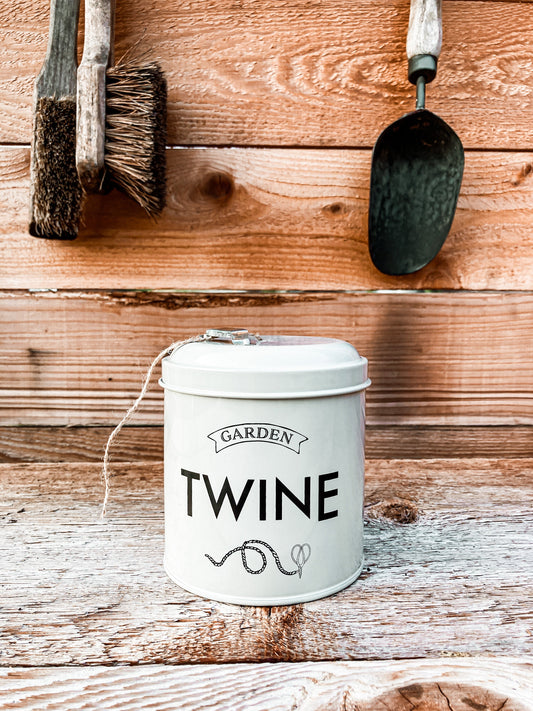 Deluxe Garden Twine Dispenser by Seattle Seed Company showing a metal dispenser with garden twine spool.