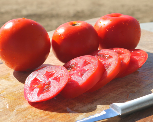 Packet of Itz a Keeper Hybrid Tomato Seeds by Seeds 'n Such showing 12-15 seeds in a colorful seed packet.