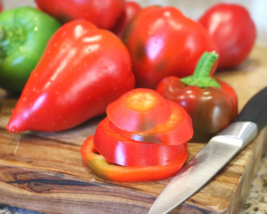 Packet of Pimiento Elite Hybrid Pepper Seeds from Seeds 'n Such showing 12 to 15 seeds in a colorful seed packet.
