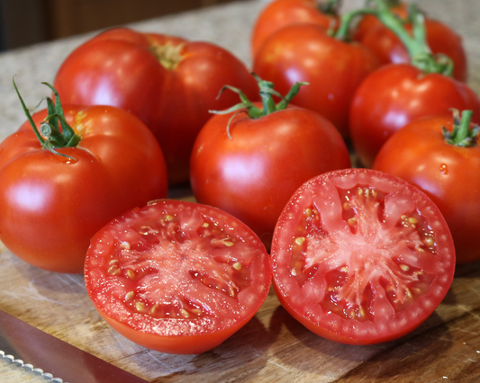 Packet of Better Boy Plus hybrid tomato seeds from Seeds 'n Such, showing 15 to 20 seeds inside a printed seed packet.