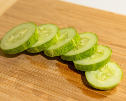 Packet of Seeds 'n Such Burpless Tasty Green No. 26 Hybrid Cucumber Seeds showing seed packet with green cucumber images