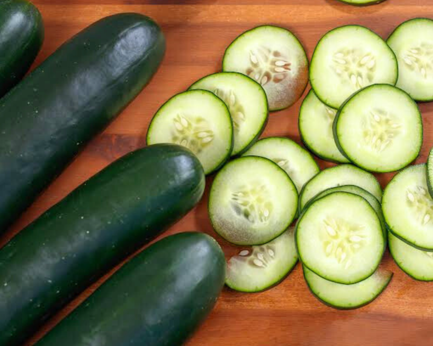 Packet of Seeds 'n Such Slice More Burpless Hybrid Cucumber Seeds showing 25 to 30 seed grains in a colorful packet.