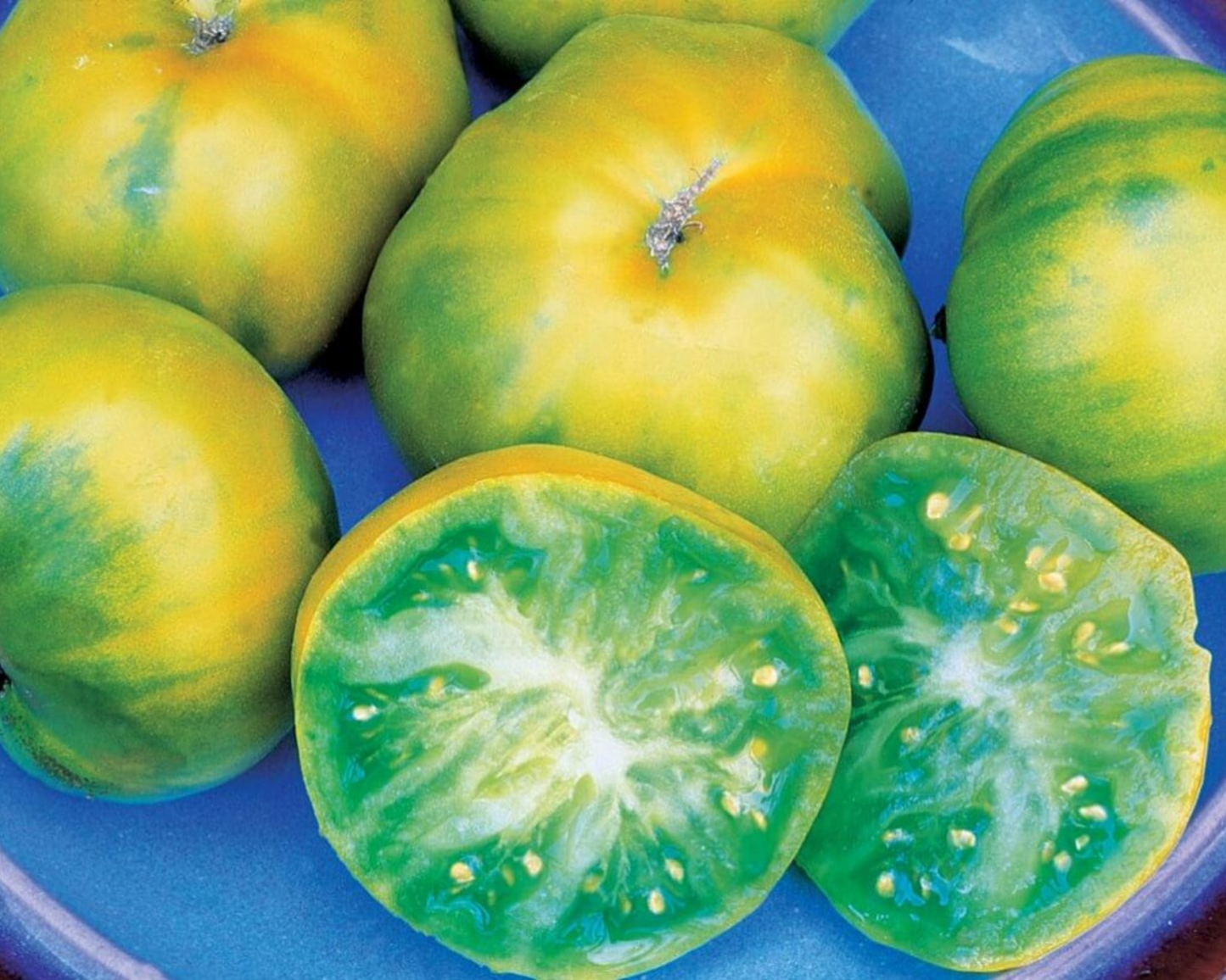 A packet of Aunt Ruby's German Green Tomato Seeds from Seeds 'n Such, featuring 30 green tomato seeds in a colorful packet.