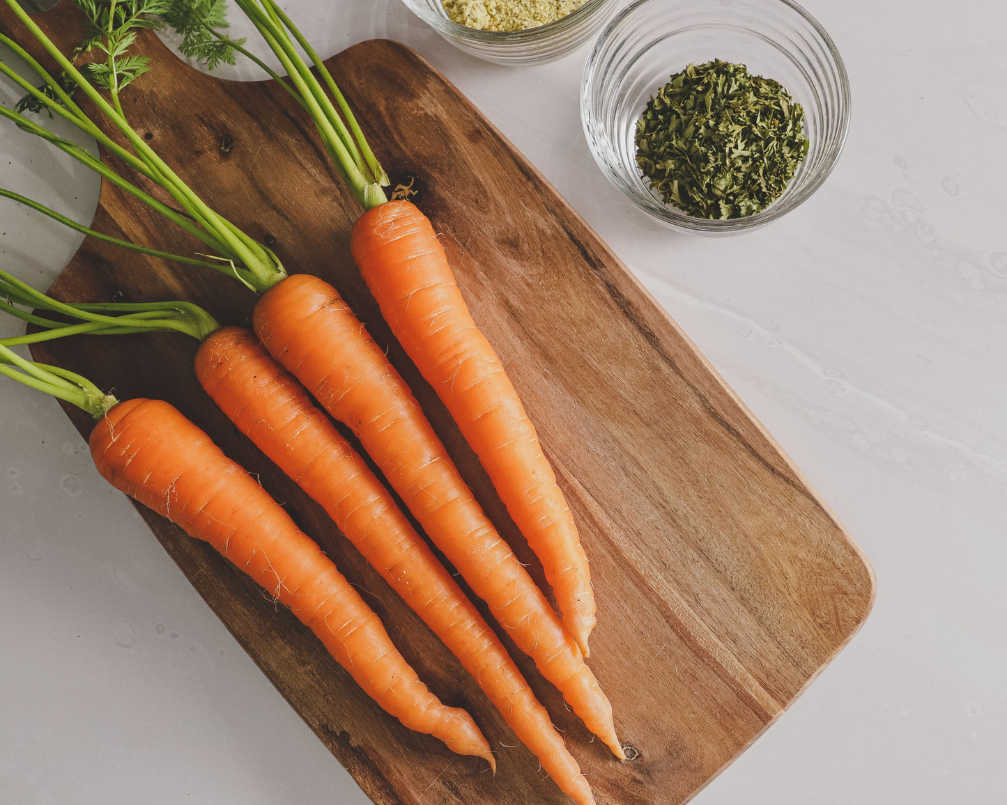 Packet of Envy Hybrid Carrot Seeds by Seeds 'n Such, showing 500 seeds in a colorful seed packet.