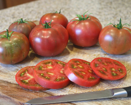 Purple Boy Hybrid Tomato Seeds packet from Seeds 'n Such showing vibrant seeds for planting and growing purple hybrid tomatoes.