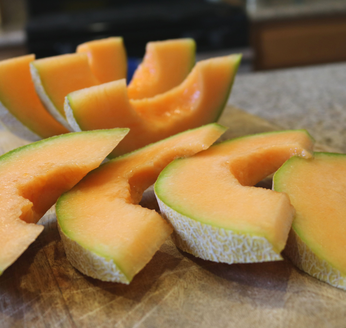 Seeds 'n Such Ambrosia Hybrid Cantaloupe Seeds in seed tape packet, featuring 12-15 seeds for planting and growing cantaloupe.