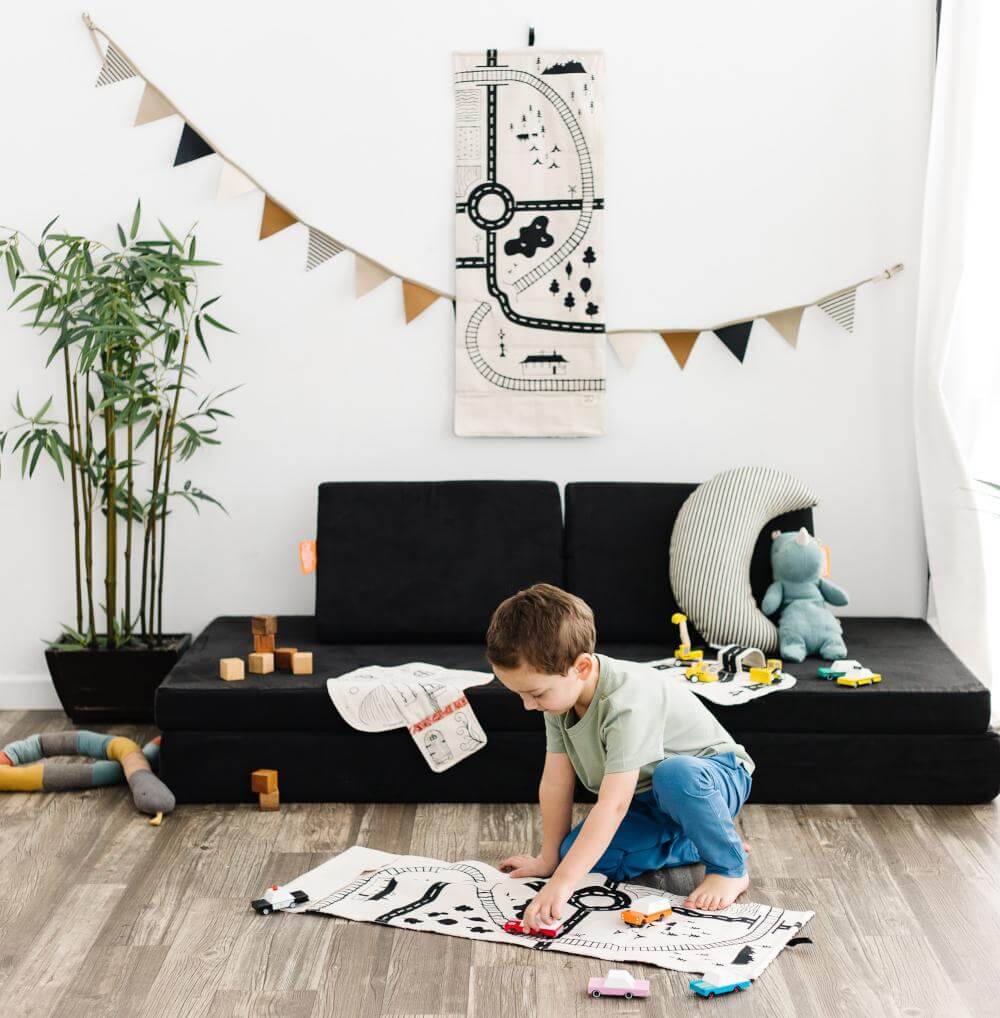 Colorful playmat with roads and city designs from So Handmade Shop, perfect for kids' play areas.