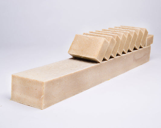 Bar of Soap for Sinners oatmeal and honey soap with a creamy, textured surface and natural honey accents.