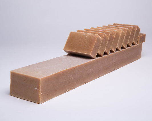 Bar of Soap for Sinners Tea Tree Lemon with Honey soap showing the rectangular shape and natural textured surface