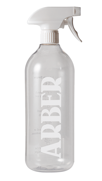 The Arber Spray Bottle features a clear plastic body and a white trigger nozzle, with Arber in bold white letters on the front—ideal for effortless plant care and easy garden hydration.