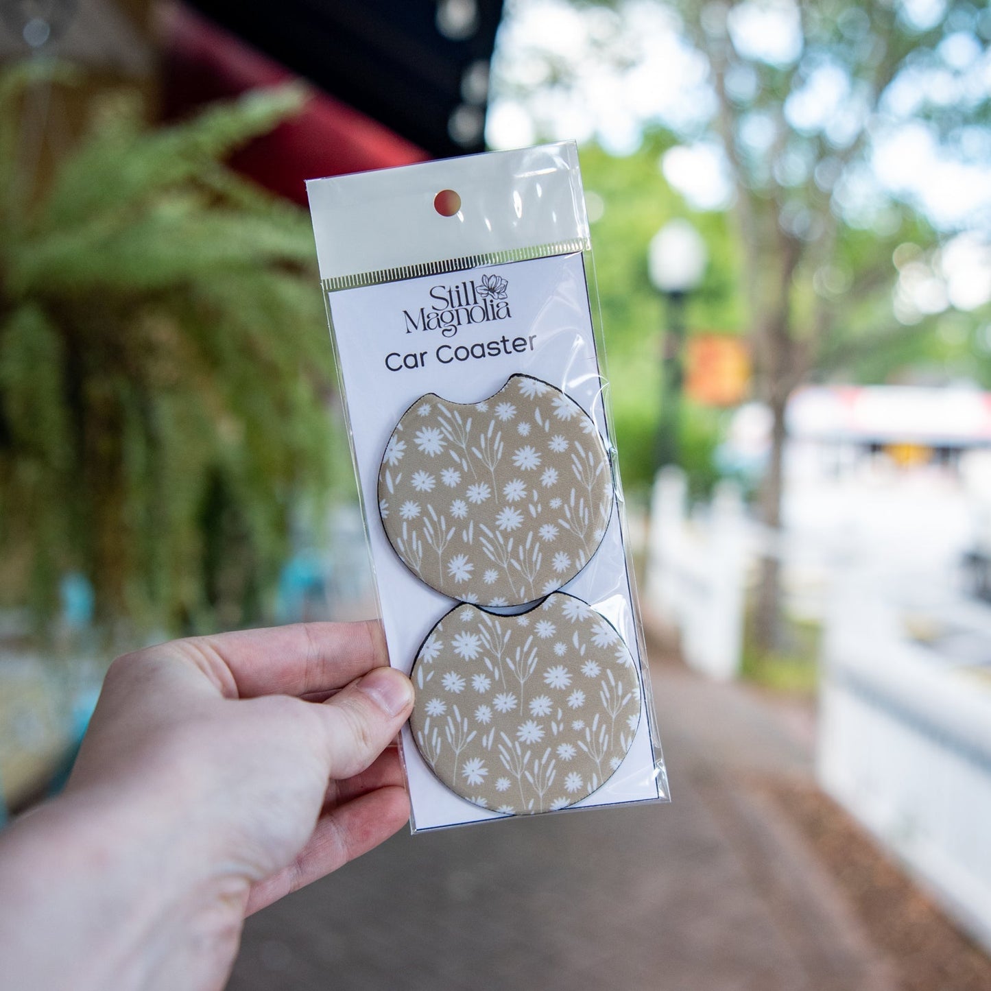 Still Magnolia car coaster with Daisy Daydream pattern featuring colorful floral design for vehicle cup holders